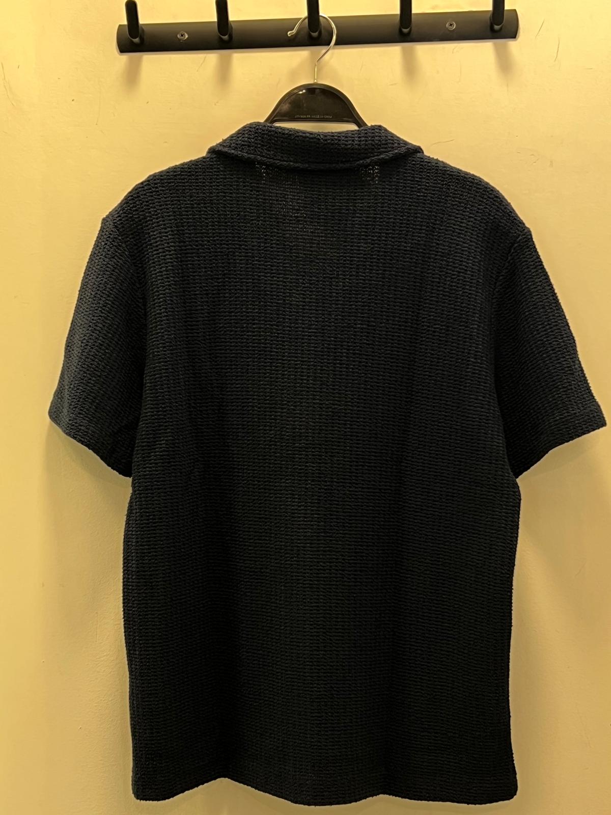 חולצה מכופתרת – תמונה 2